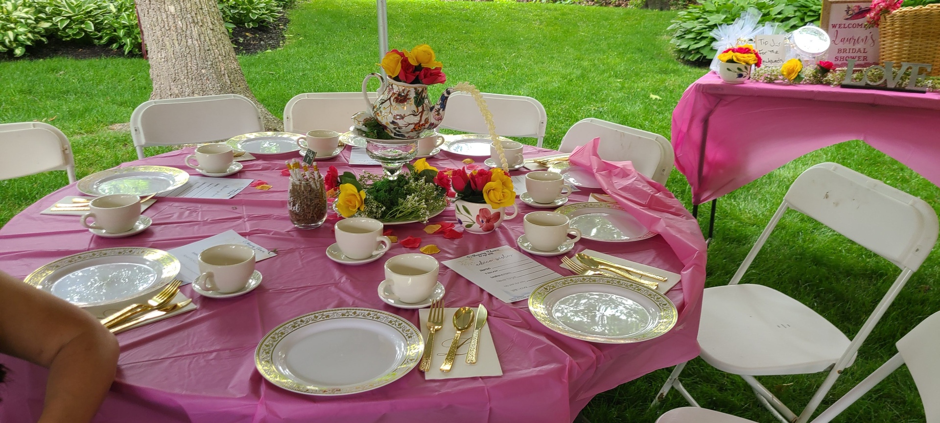 Pink tea party table decor with balloon accents by Simone's Creations DMV
